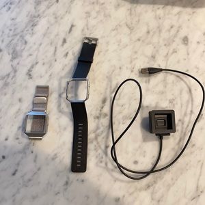 Fit bit blaze charger and 2 bands.